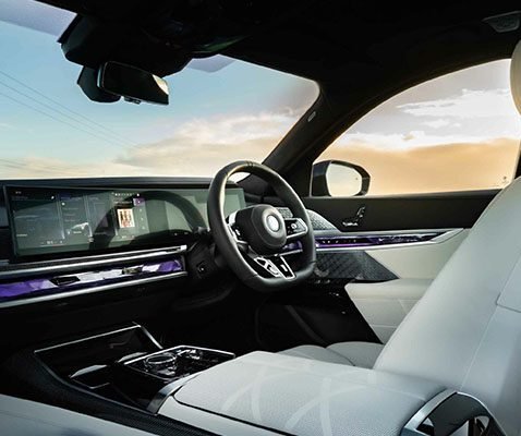 BMW 7 Series with a professional chauffeur offering an exclusive and luxurious transportation experience in London.